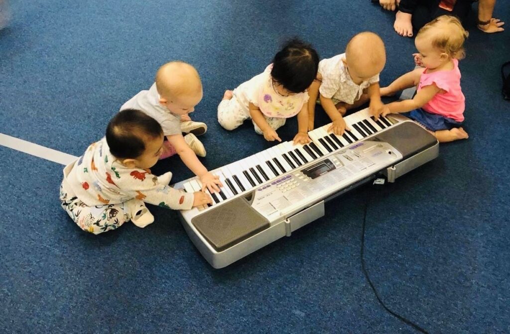 early music education, benefits of music for children, music lessons for kids, why kids should learn music, child development through music, music and brain development, piano lessons for kids, music classes for children, learning music early, music benefits for kids